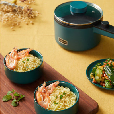 Introducing our Non-Stick Pan with an Inner Pot that takes your cooking experience to the next level. The inner pot is designed for even heating, ensuring your meals are perfectly cooked every time, and cleaning up is a breeze thanks to its smooth surface. Our pan features an anti-scalding and heat-insulating handle design, offering convenience and safety while moving it around the kitchen