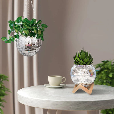 Add spice and sparkle to your home while giving life to the surroundings with a Disco Ball Flower Hanging Vase. This vase has been handcrafted with attention paid to every detail to bring you a sophisticated design with hints of bohemian style